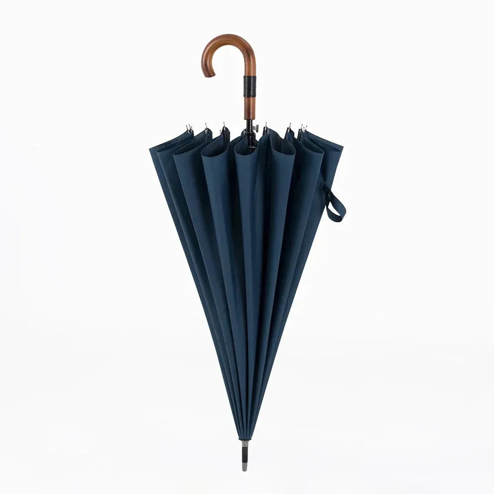 The elegant large 16-rib rain umbrella with a wooden handle, shown closed in navy blue.