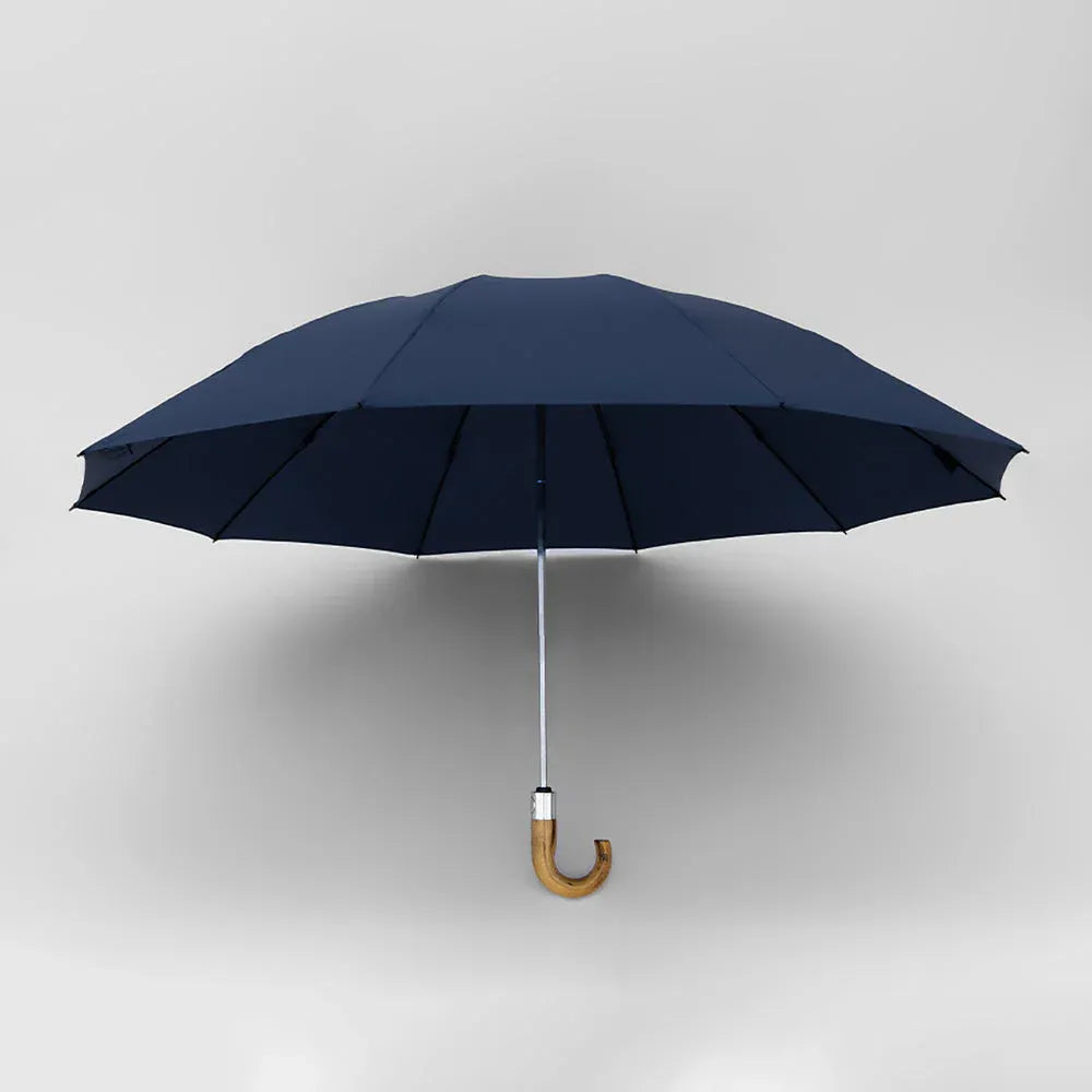 The automatic inverted umbrella with wooden J-handle, shown open in sophisticated navy blue.