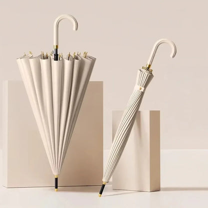 The 24-rib ladies storm proof umbrella with a leather crook handle in an elegant beige cream color.