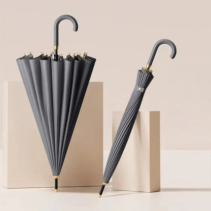 The 24-rib ladies storm proof umbrella with a leather crook handle in a modern grey color.