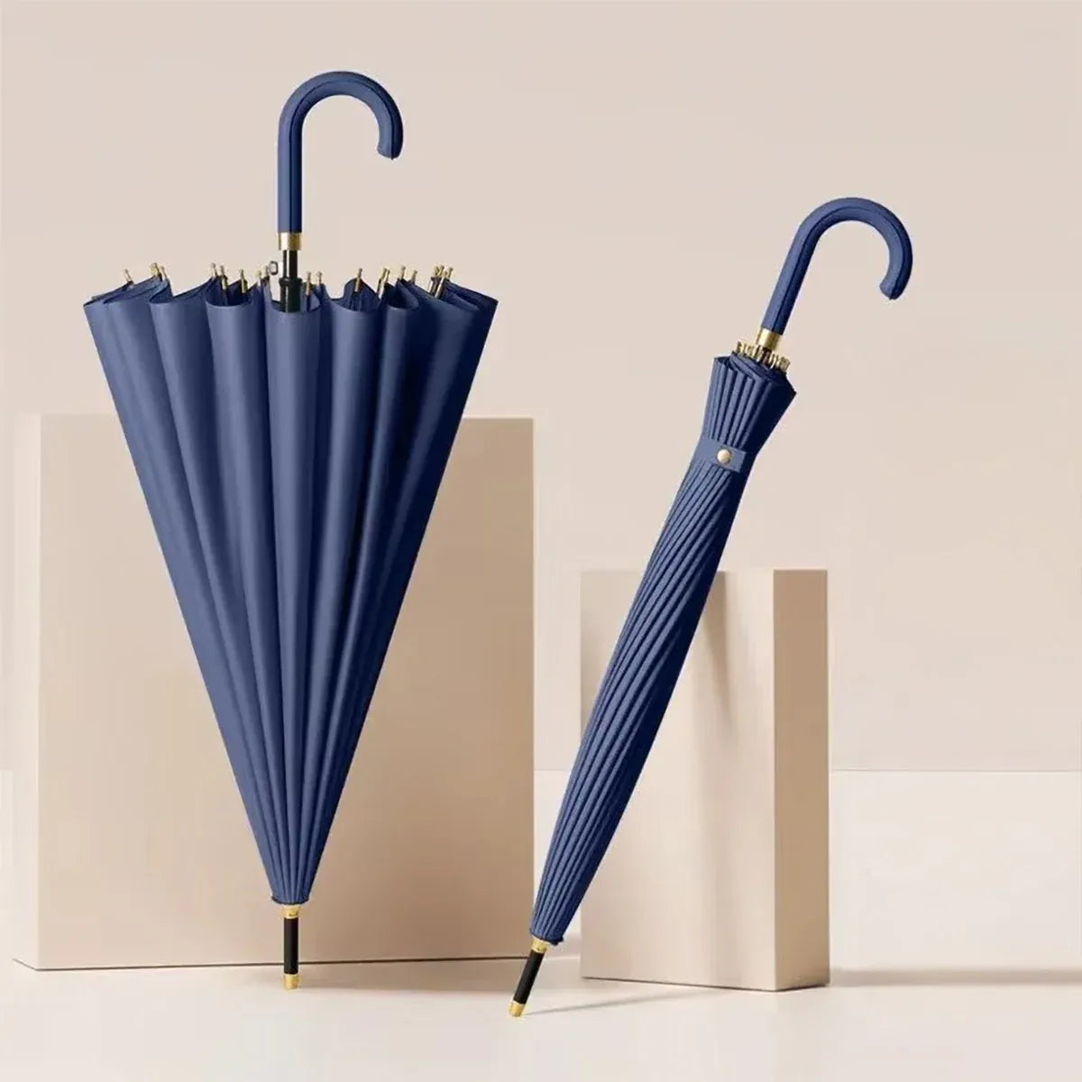 The 24-rib ladies storm proof umbrella with a leather crook handle in a sophisticated navy blue color.