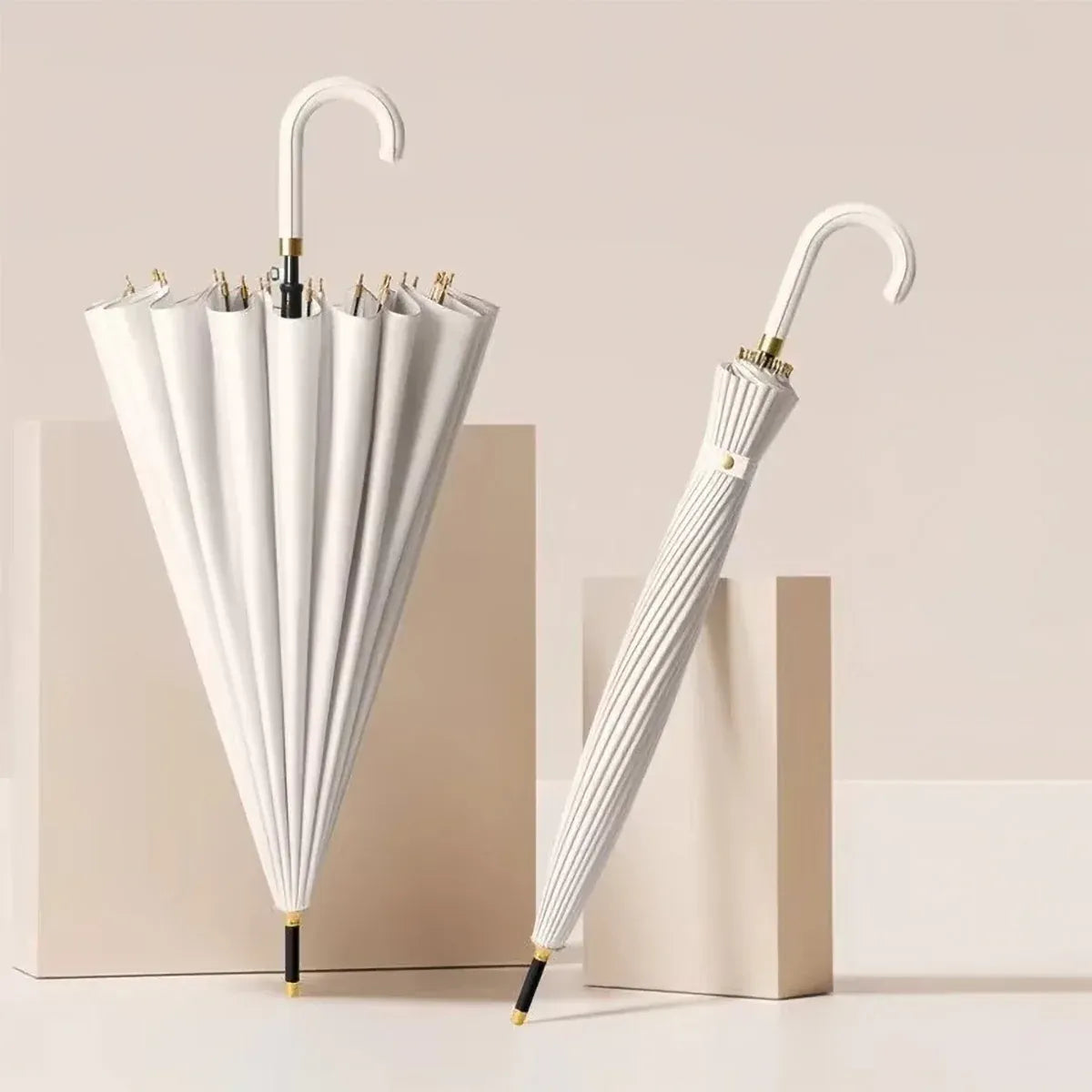 The 24-rib ladies storm proof umbrella with a leather crook handle in a classic white color.