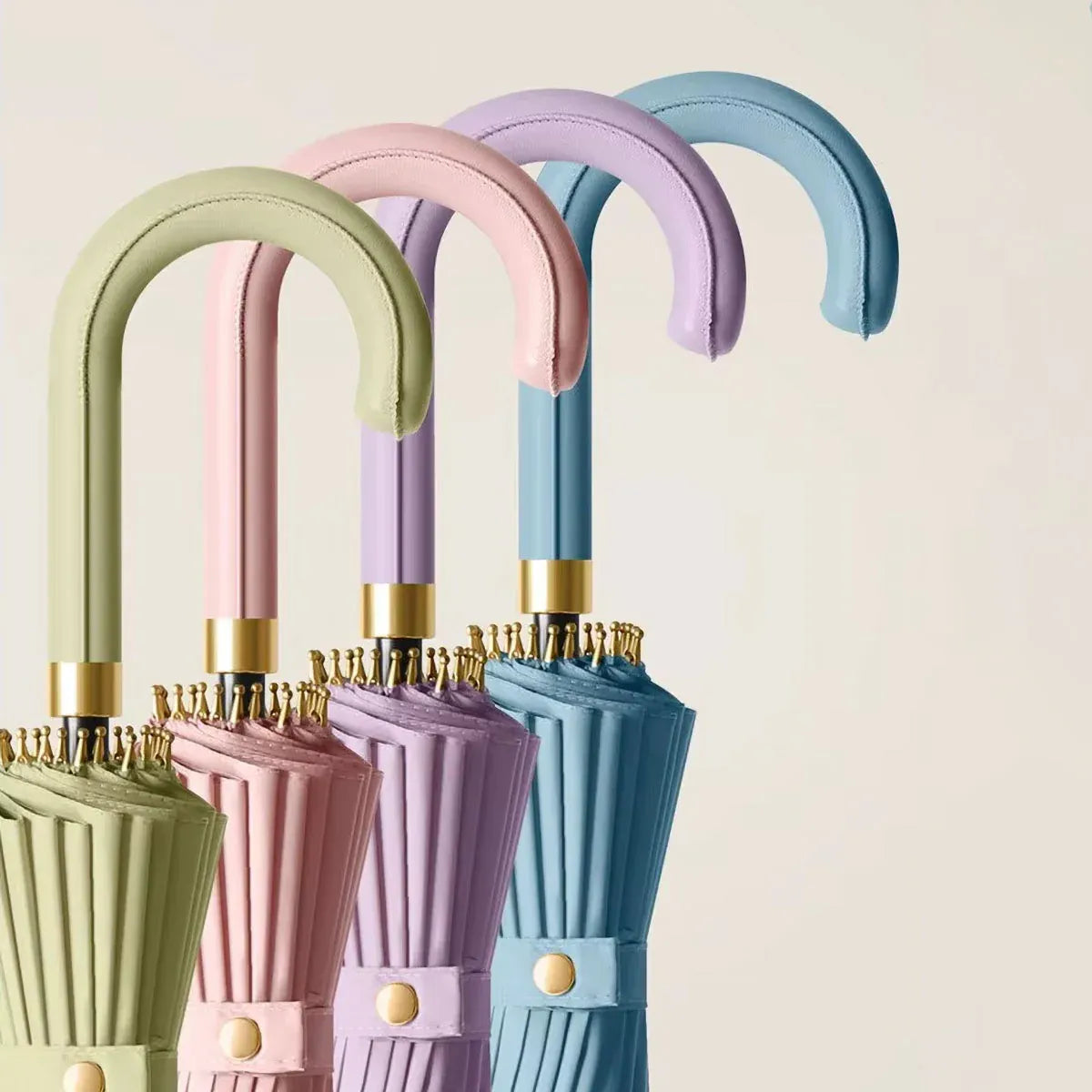 A lineup of the elegant leather crook handles for the 24-rib ladies umbrella in various pastel colors.