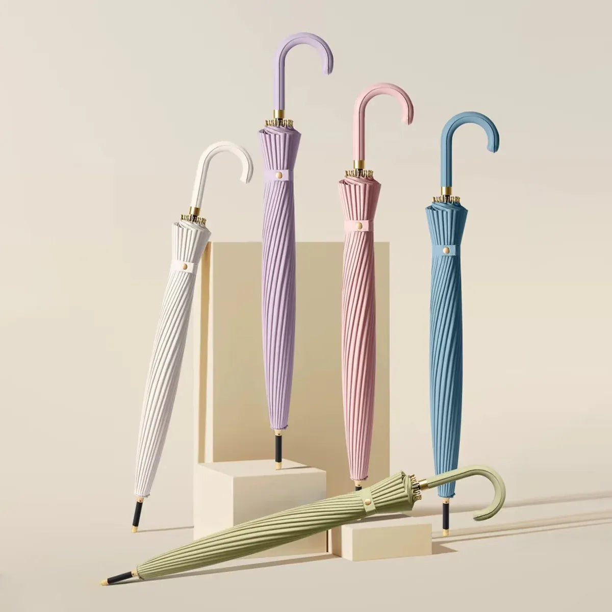 A stylish assortment of the 24-rib ladies storm umbrellas in white, lilac, pink, blue, and sage green.
