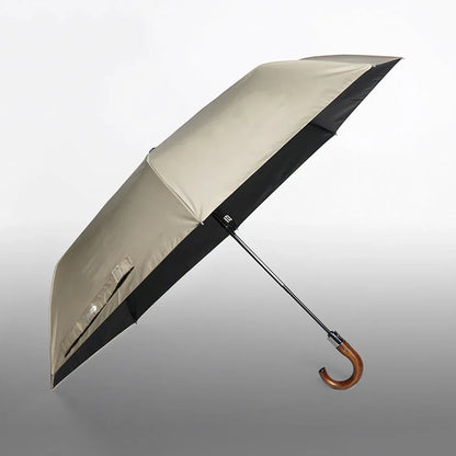 The large 48-inch fully automatic folding umbrella shown open in an elegant khaki beige color.