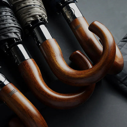 An assortment of the classic wooden hook handles, highlighting the quality craftsmanship and wood grain.