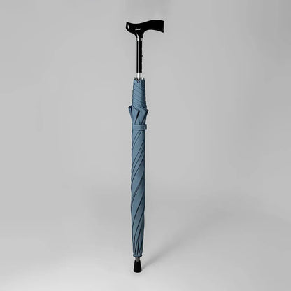 The light blue version of the adjustable walking stick umbrella shown closed without its sleeve.