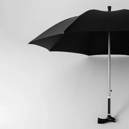The adjustable walking stick umbrella partially open, displaying the large black canopy and sturdy aluminum shaft.