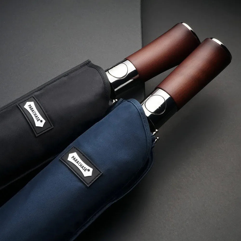 The black and navy blue umbrella sleeves, showing the durable fabric and logo tag.