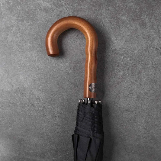 Another close-up angle of the elegant wooden crook handle, highlighting the wood grain.