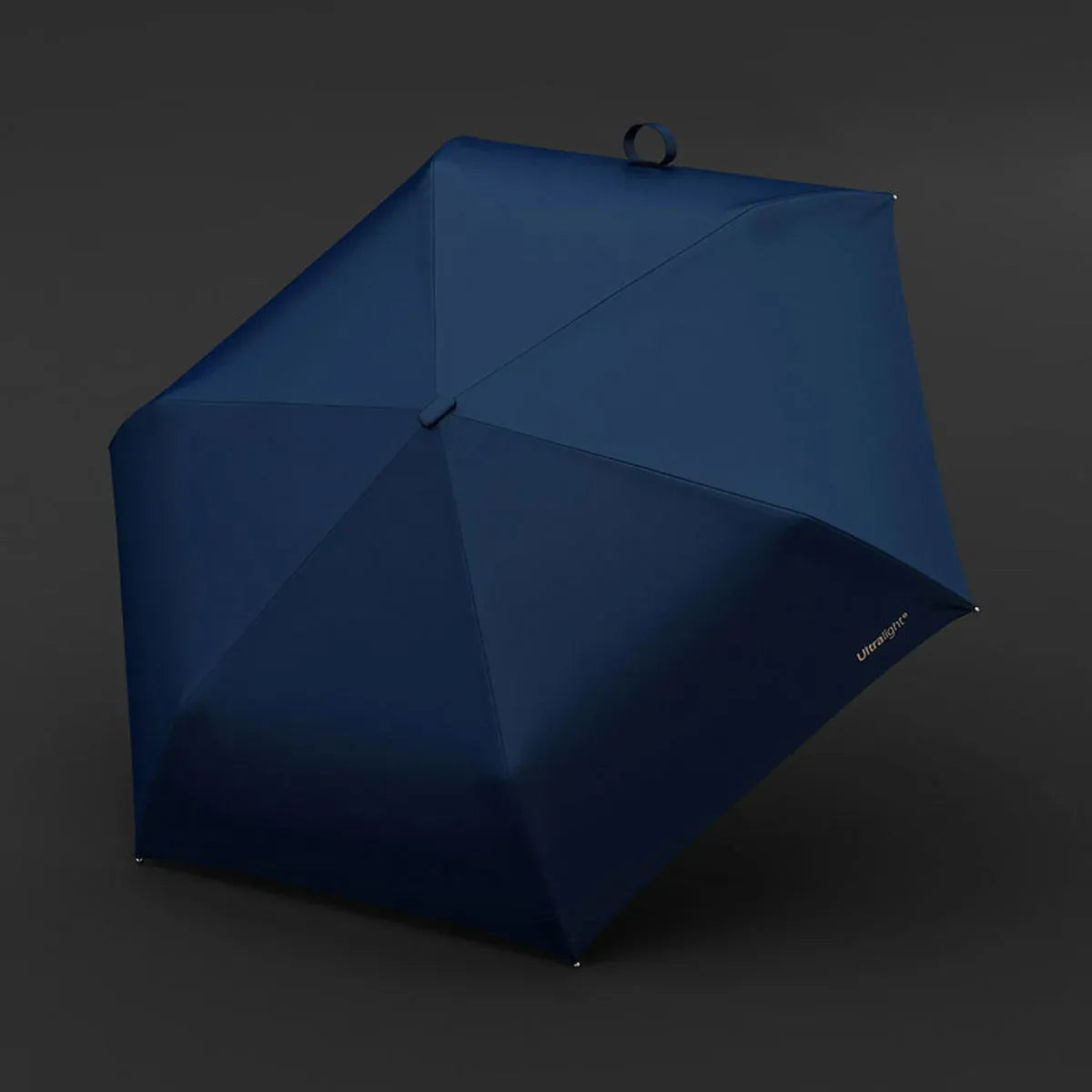 Top-down view of the open navy blue canopy on the elegant automatic travel umbrella.