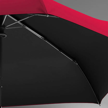 Close-up detail from underneath the red and black canopy showing the frame structure.