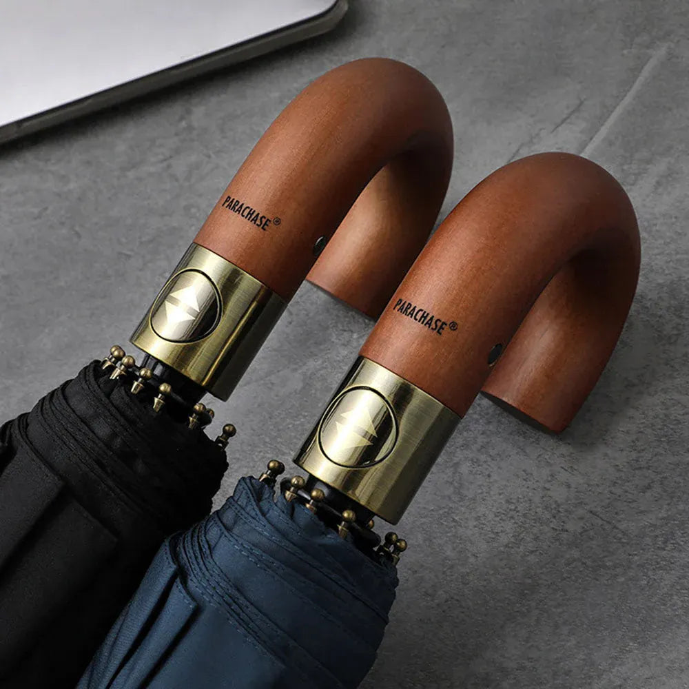 Close-up of the wooden J-handles showing the automatic open/close button and metal accents.