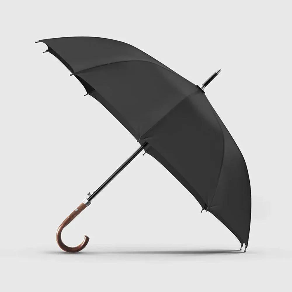 Profile view of the open Gents Black Umbrella with its classy wooden crook handle.