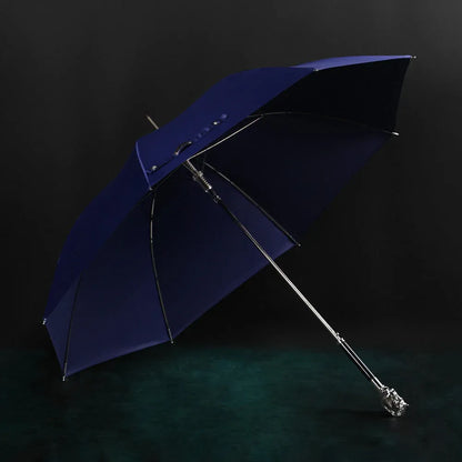 Profile view of the open blue canopy on the elegant silver horse head handle umbrella.