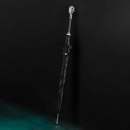 Full profile view of the closed black stick umbrella featuring the silver horse head handle.