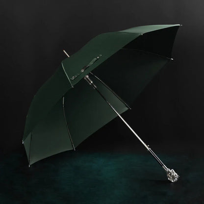 Profile view of the open green canopy on the elegant silver horse head handle umbrella.