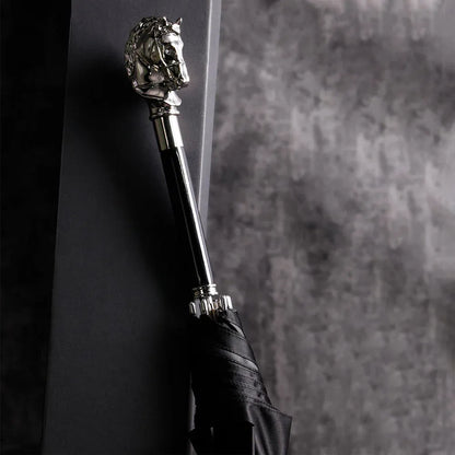 The elegant stick umbrella with a silver horse head handle, shown closed in black.
