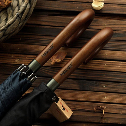 Detailed view of the elegant wooden handle on the Imperial Classic umbrella.