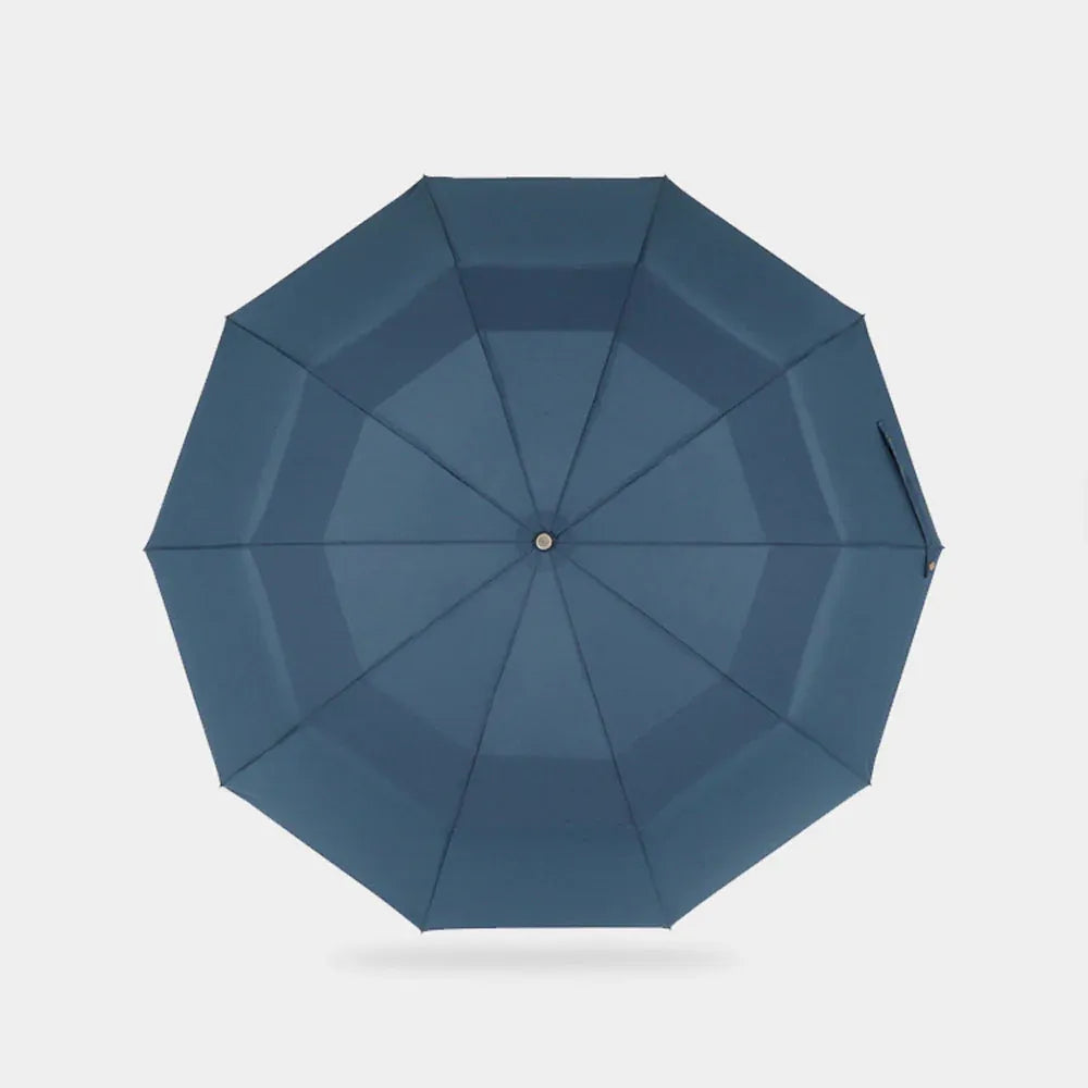 Top-down view of the large open navy blue double canopy showing the windproof vents.