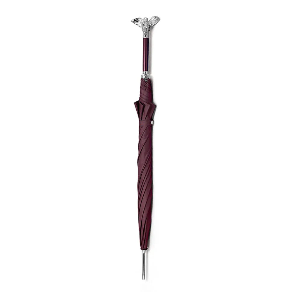 Full length view of the closed luxury burgundy umbrella featuring the silver angel handle.