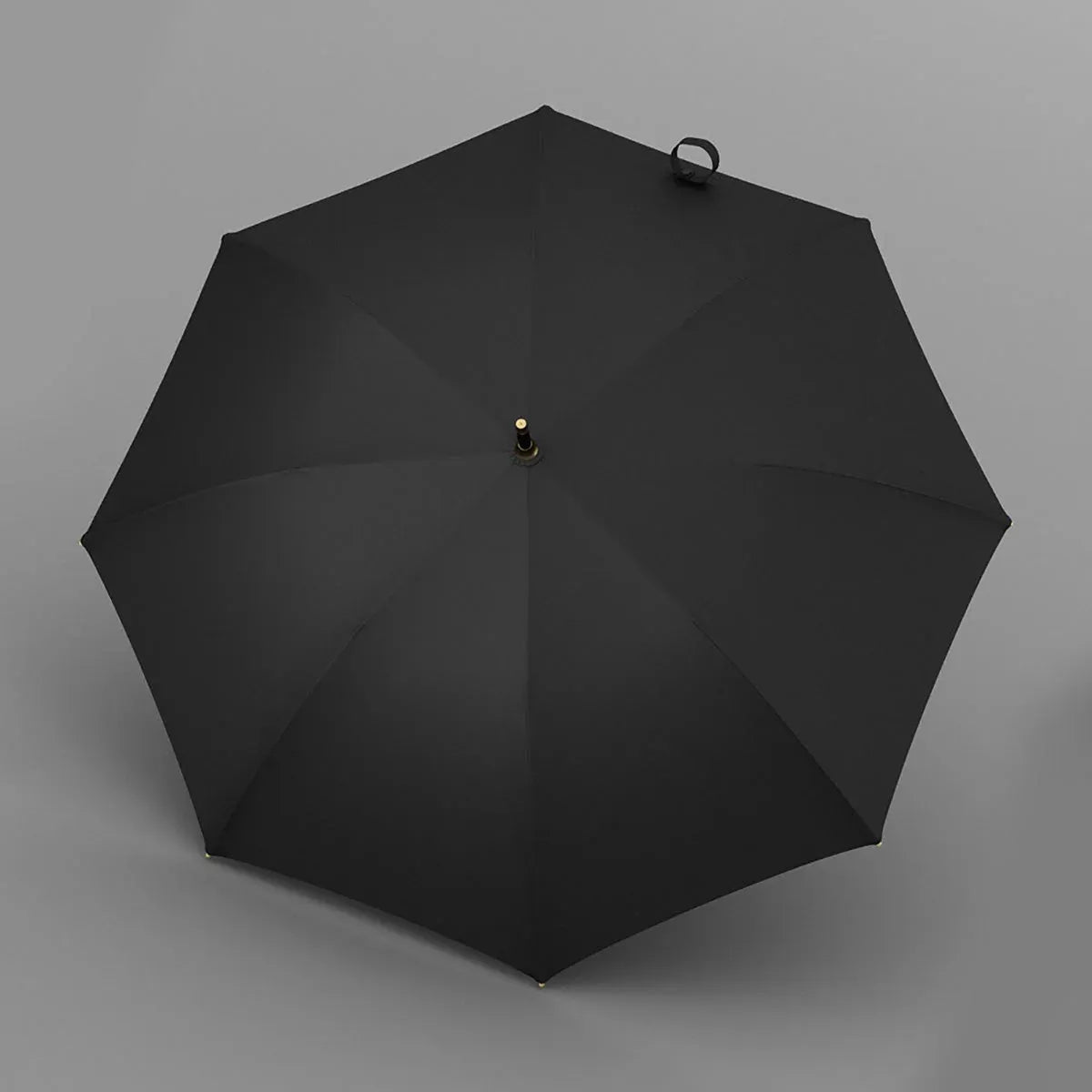 Top-down view of the open black luxury umbrella showing the 8-rib canopy.