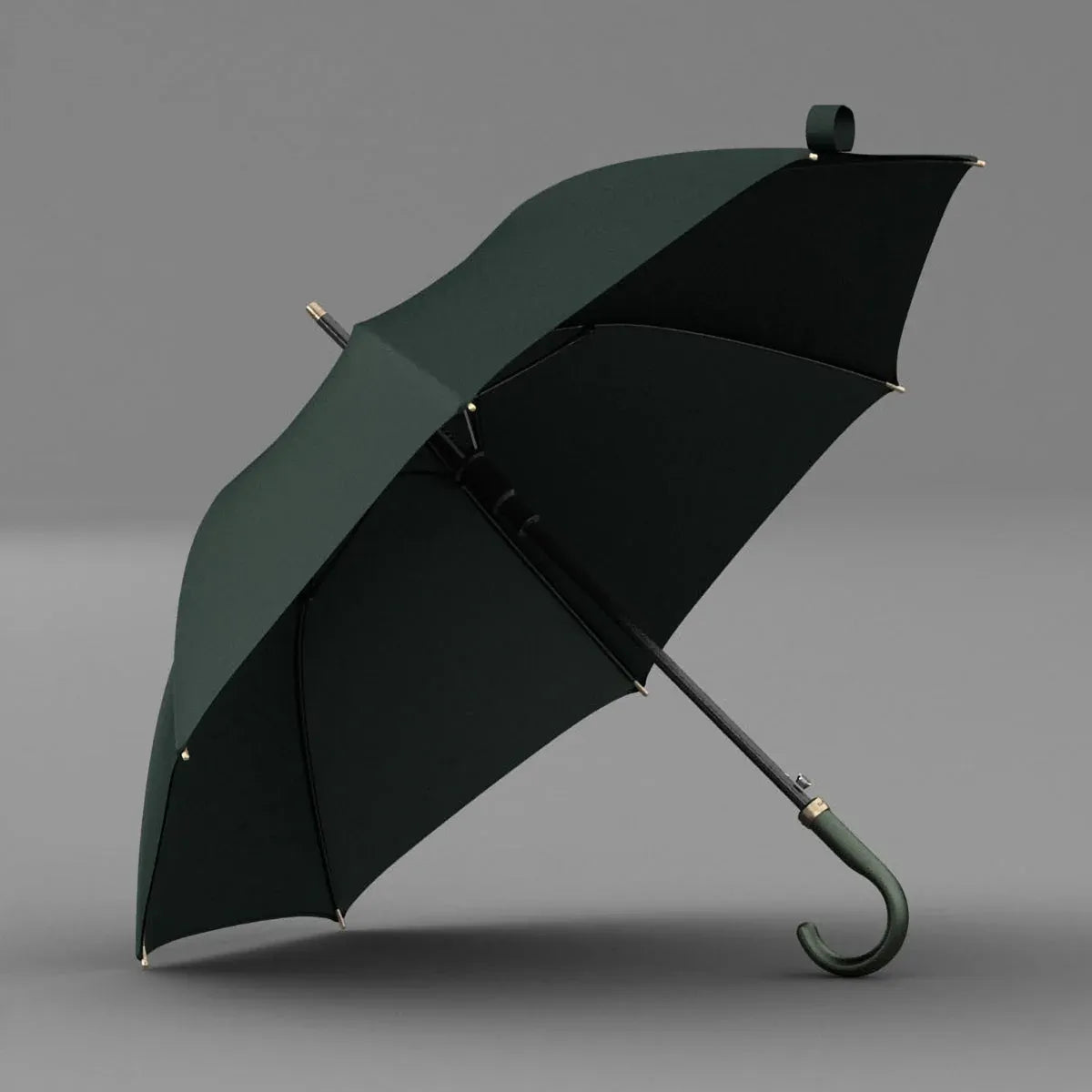 Angled view of the open green canopy on the luxury leather handle umbrella.