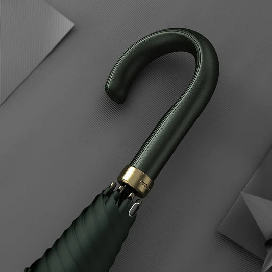 Close-up of the genuine leather handle on the luxury umbrella.