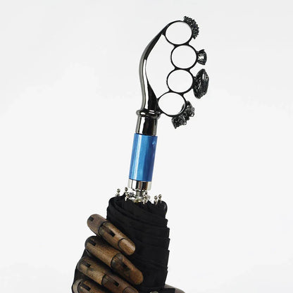 The luxury gothic folding umbrella featuring the iconic ring handle with a blue metallic accent.