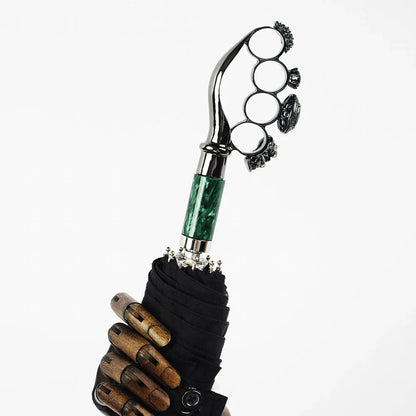 The luxury gothic folding umbrella featuring the iconic ring handle with a green marble accent.