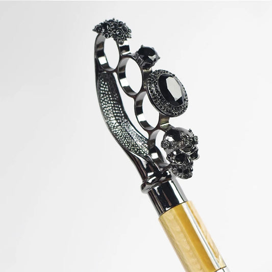 Close-up of the exquisite ring handle on the luxury folding umbrella.