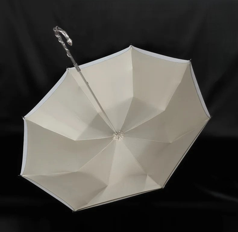 Frame detail of the luxury snake umbrella, designed for strength and style.