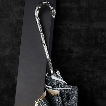 Lifestyle shot of the unique silver snake handle and serpent pattern canopy.