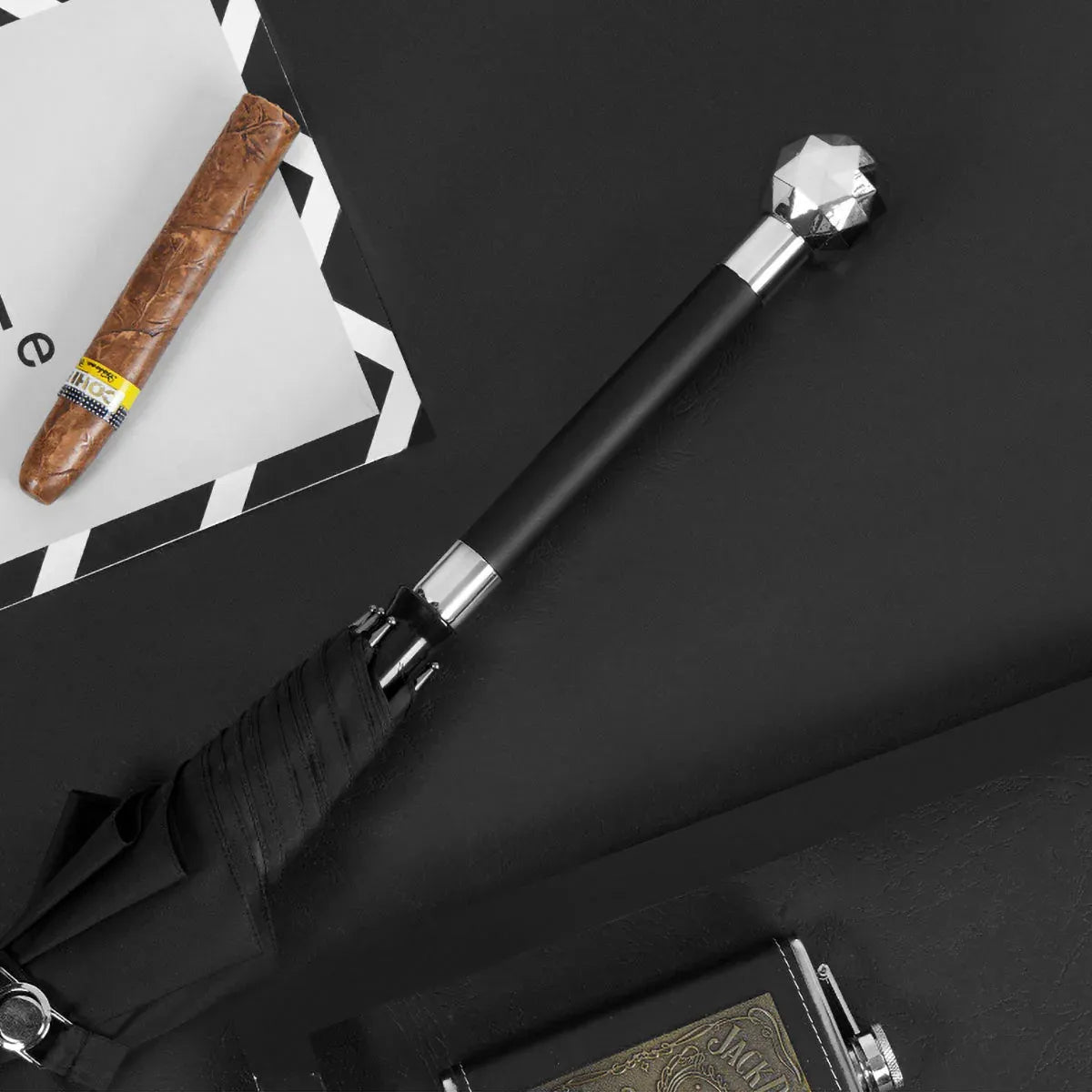 The luxury 2-in-1 walking cane umbrella featuring the silver Diamond cut handle design.