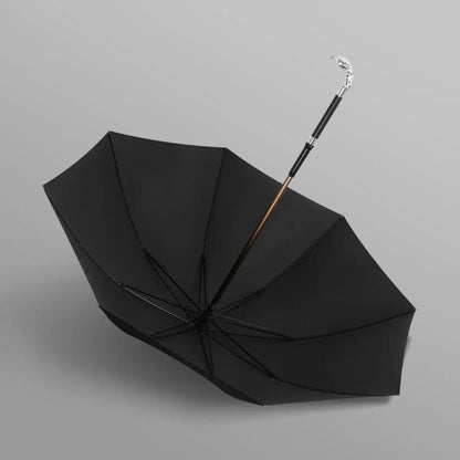 Full profile view of the open black canopy on the walking cane umbrella with the silver Eagle handle.