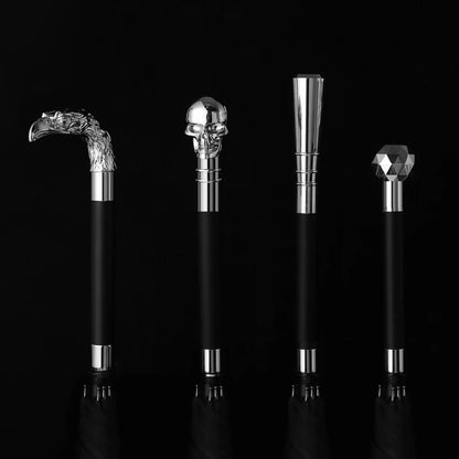 Close-up showing four interchangeable silver handle options: Eagle, Skull, Pillar, and Diamond.
