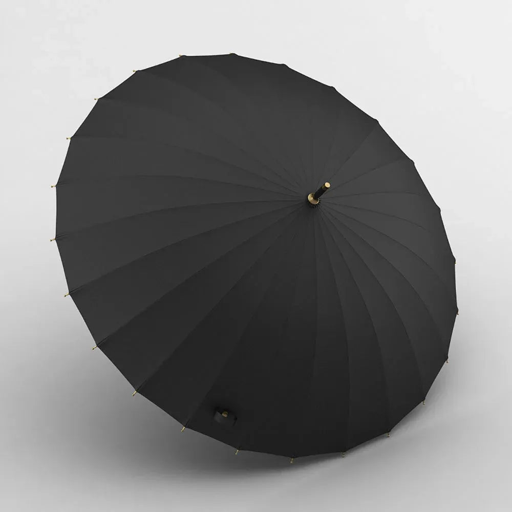 Top-down view of the open black 24-rib canopy, showcasing its exceptional roundness and strength.