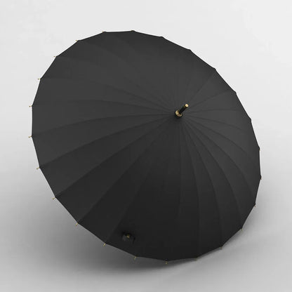 Top-down view of the open black 24-rib canopy, showcasing its exceptional roundness and strength.