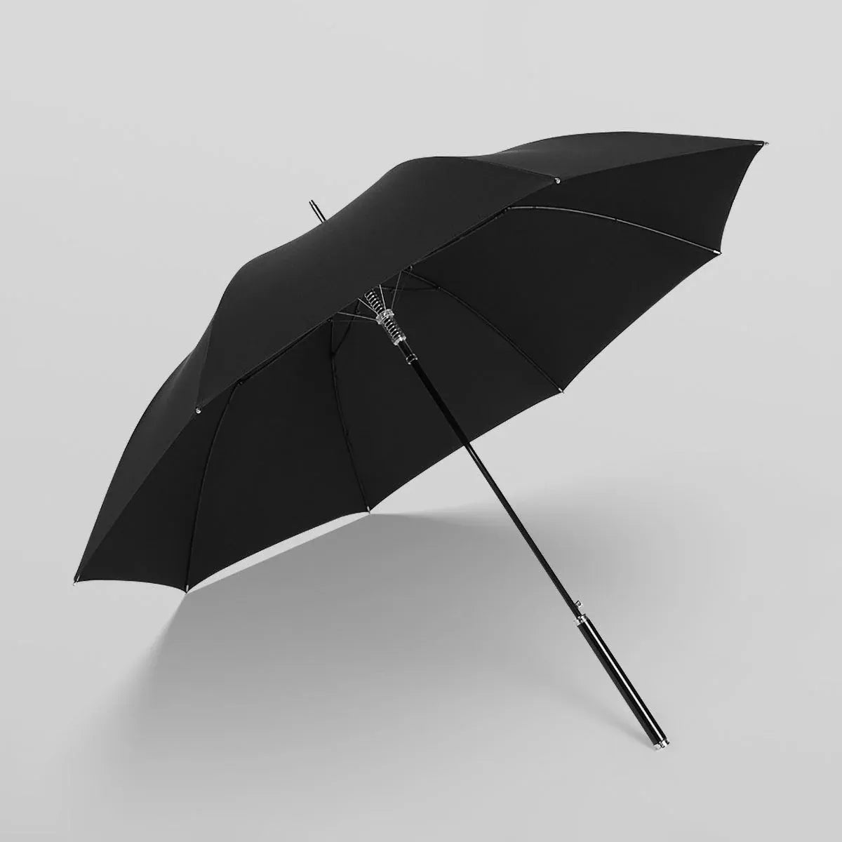 Profile view of the open black premium long handle umbrella, showcasing its durable canopy.