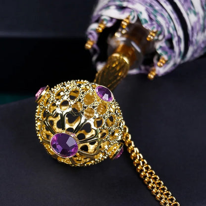 Close-up of the elegant crystal handle on the Purple Flower Umbrella.