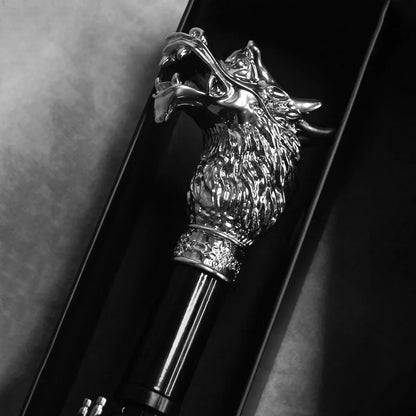 Dramatic close-up of the sculpted silver Dragon handle inside its packaging.