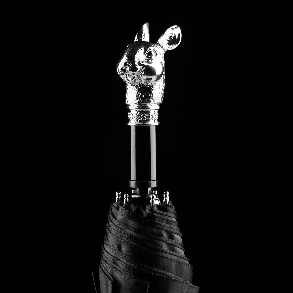 The silver animal head folding umbrella featuring the intricately detailed Rabbit handle against a black background.